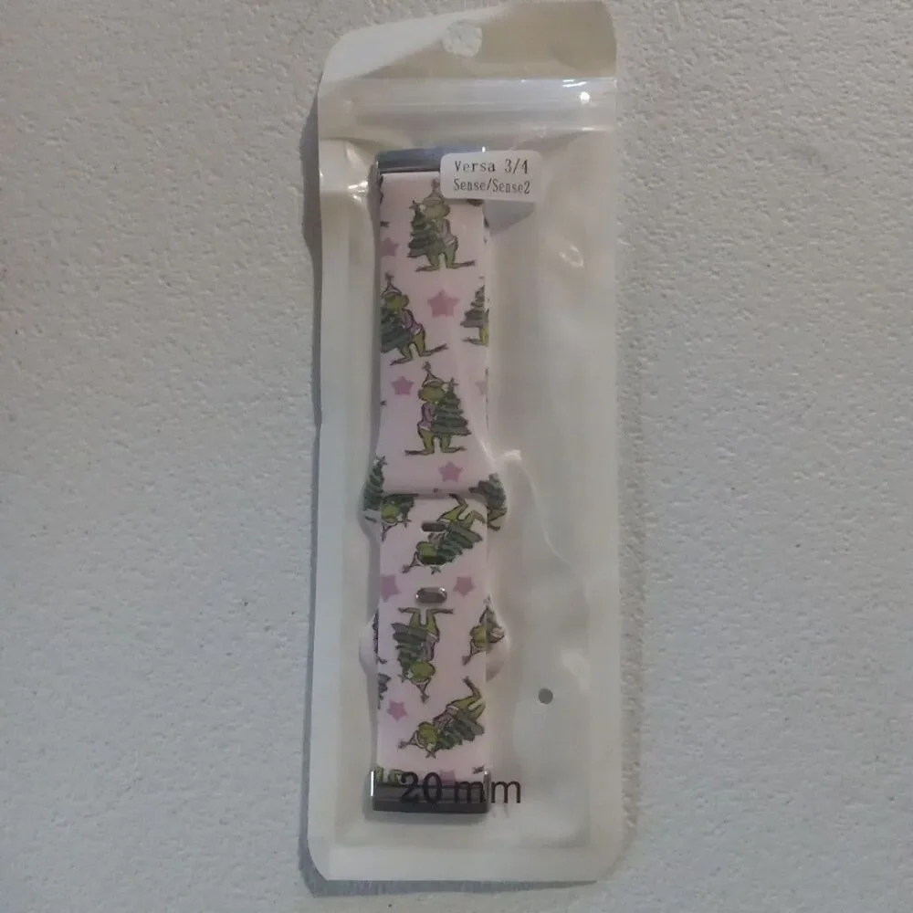 Versa 3/4 Sense/ Sence2 Band Pink With Grinch And Tree On It